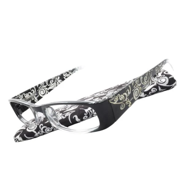 Augenstolz Fertiglesebrille Filigrano Soo – Lesebrille mit Rahmen im schwarz-orangen Ornamentmuster, daneben aufgestelltes Etui im passenden Muster